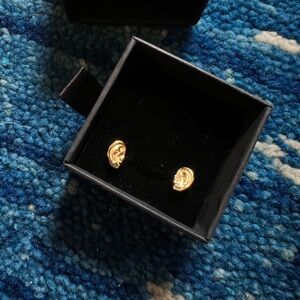 Fashion Brand Company ears wearing emerald earrings studs